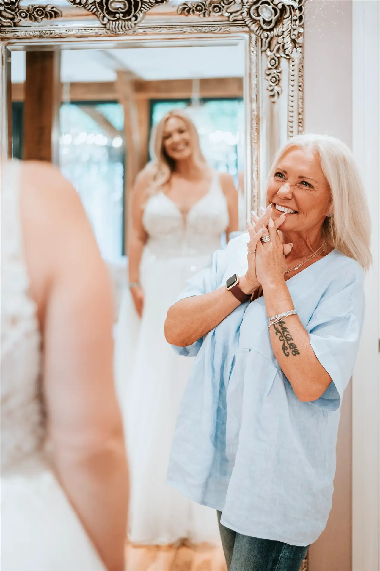 Bride trying on a wedding dress at Barn Bridal Boutique